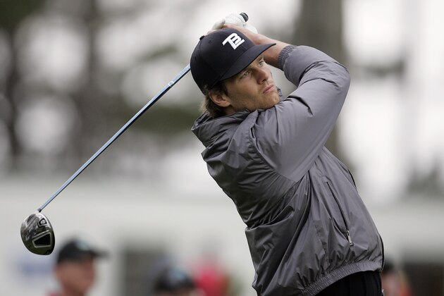 New England Patriots quarterback Tom Brady hits off the 10th tee during the second round of the AT&T Pebble Beach National Pro-Am golf tournament at the Spyglass Hill golf course in Pebble Beach, Calif., Friday, Feb. 12, 2010. (AP Photo/Tony Avelar)