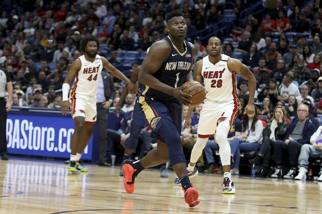 New Orleans Pelicans forward Zion Williamson (1) drives to the basket in the second half of an NBA basketball game against the Miami Heat in New Orleans, Friday, March 6, 2020. (AP Photo/Rusty Costanza)