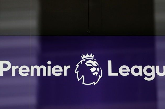 The logo is pictured through a glass window at the headquarters of the English Premier League in London on March 13, 2020. - The English Premier League suspended all fixtures until April 4 on Friday after Arsenal manager Mikel Arteta and Chelsea winger Callum Hudson-Odoi tested positive for coronavirus. (Photo by Isabel Infantes / AFP) (Photo by ISABEL INFANTES/AFP via Getty Images) The logo is pictured through a glass window at the headquarters of the English Premier League in London on March 13, 2020. - The English Premier League suspended all fixtures until April 4 on Friday after Arsenal manager Mikel Arteta and Chelsea winger Callum Hudson-Odoi tested positive for coronavirus. (Photo by Isabel Infantes / AFP) (Photo by ISABEL INFANTES/AFP via Getty Images)