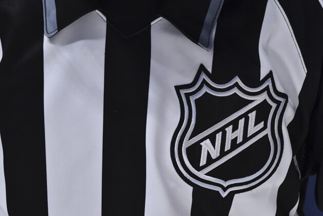 MONTREAL, QC - DECEMBER 11:  The NHL crest is seen on a linesman