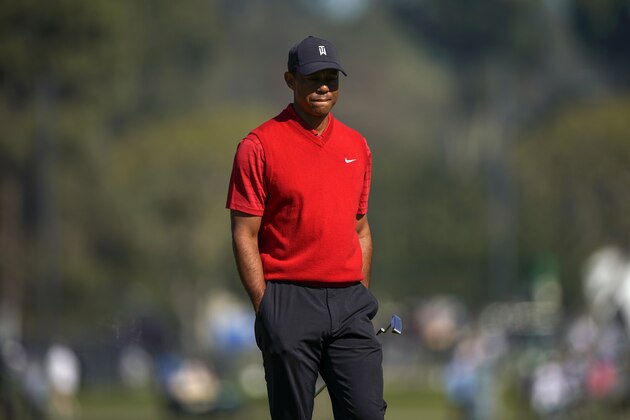 Tiger Woods looks on from the tenth green during the final round of the Genesis Invitational golf tournament at Riviera Country Club, Sunday, Feb. 16, 2020, in the Pacific Palisades area of Los Angeles. (AP Photo/Ryan Kang)