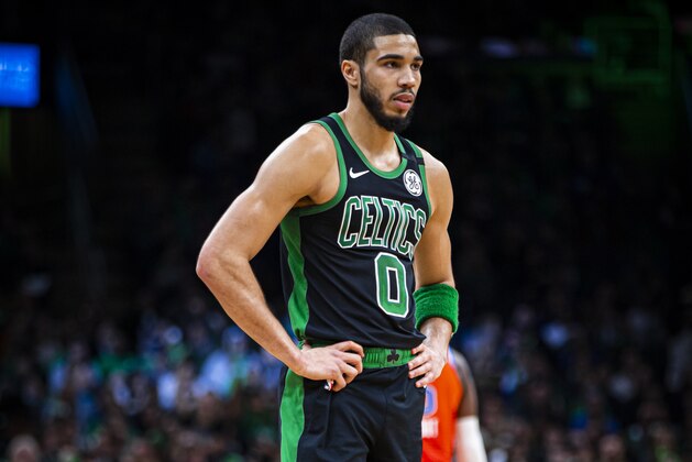 BOSTON, MA - MARCH 8: Jayson Tatum #0 of the Boston Celtics looks on during the game against the Oklahoma City Thunder on March 8, 2020 at the TD Garden in Boston, Massachusetts.  NOTE TO USER: User expressly acknowledges and agrees that, by downloading and or using this photograph, User is consenting to the terms and conditions of the Getty Images License Agreement. Mandatory Copyright Notice: Copyright 2020 NBAE  (Photo by Zach Beeker/NBAE via Getty Images)