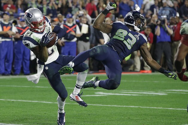 FILE- In this Feb. 1, 2015, file photo, New England Patriots strong safety Malcolm Butler (21) intercepts a pass intended for Seattle Seahawks wide receiver Ricardo Lockette (83) during the second half of NFL Super Bowl XLIX football game in Glendale, Ariz. The last time the Seahawks and Patriots were on the same field, Butler was making a Super Bowl-saving play for New England.  (AP Photo/Kathy Willens, File)