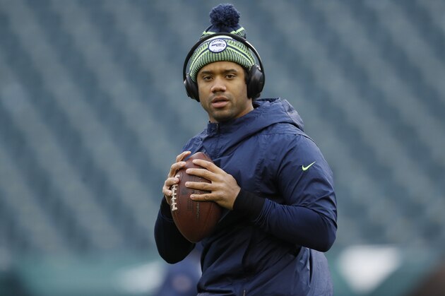 Seattle Seahawks' Russell Wilson warms up before an NFL wild-card playoff football game against the Philadelphia Eagles, Sunday, Jan. 5, 2020, in Philadelphia. (AP Photo/Michael Perez)