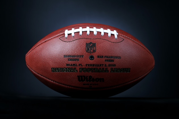 An official ball for the NFL Super Bowl LIV football game with the Kansas City Chiefs logo that was made at the Wilson Sporting Goods Co. in Ada, Ohio, Monday, Jan. 20, 2020. The Kansas City Chiefs will play the San Francisco 49ers in the Super Bowl LIV on Feb. 2, in Miami. (AP Photo/Ron Schwane)