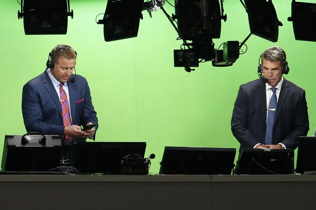 ATLANTA, GA - JANUARY 08: ESPN television personalities Kirk Herbstreit (left) and Chris Fowler prepare for the College Football Playoff National Championship game between the Georgia Bulldogs and the Alabama Crimson Tide at Mercedes-Benz Stadium on January 8, 2018 in Atlanta, Georgia. (Photo by Mike Zarrilli/Getty Images) ATLANTA, GA - JANUARY 08: ESPN television personalities Kirk Herbstreit (left) and Chris Fowler prepare for the College Football Playoff National Championship game between the Georgia Bulldogs and the Alabama Crimson Tide at Mercedes-Benz Stadium on January 8, 2018 in Atlanta, Georgia. (Photo by Mike Zarrilli/Getty Images)
