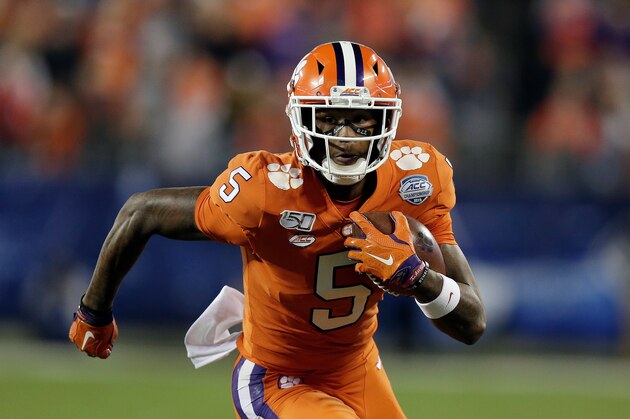 Clemson wide receiver Tee Higgins (5) runs against Virginia during the first half of the Atlantic Coast Conference championship NCAA college football game in Charlotte, N.C., Saturday, Dec. 7, 2019. (AP Photo/Gerry Broome)
