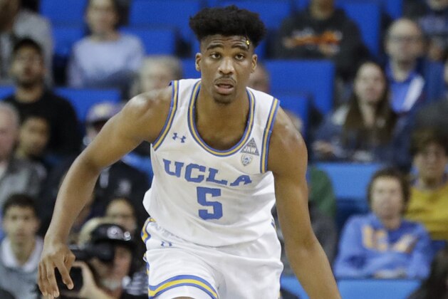 UCLA guard Chris Smith plays against Washington during the first half of an NCAA college basketball game in Los Angeles, Saturday, Feb. 15, 2020. (AP Photo/Chris Carlson)