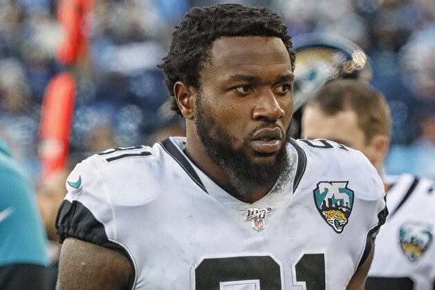 NASHVILLE, TENNESSEE - NOVEMBER 24: Yannick Ngakoue #91 of the Jacksonville Jaguars watches from the sideline during a game against the Tennessee Titans at Nissan Stadium on November 24, 2019 in Nashville, Tennessee. (Photo by Frederick Breedon/Getty Images)
