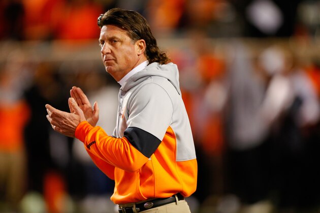 STILLWATER, OK - NOVEMBER 30:  Head coach Mike Gundy of the Oklahoma State Cowboys encourages his team before Bedlam against of the Oklahoma Sooners on November 30, 2019 at Boone Pickens Stadium in Stillwater, Oklahoma.  OU won 34-16.  (Photo by Brian Bahr/Getty Images)