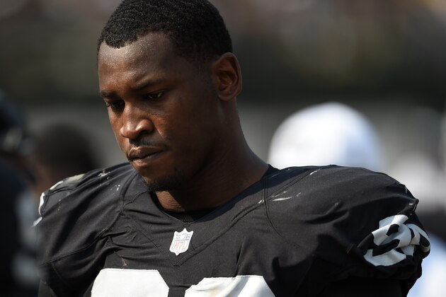 OAKLAND, CA - SEPTEMBER 13:  Aldon Smith #99 of the Oakland Raiders looks on during the second half of their NFL game against the Cincinnati Bengals at O.co Coliseum on September 13, 2015 in Oakland, California.  (Photo by Thearon W. Henderson/Getty Images)
