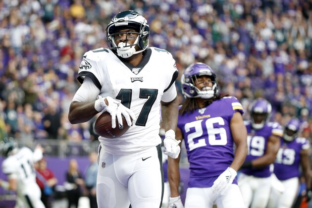 Philadelphia Eagles wide receiver Alshon Jeffery catches a 3-yard touchdown pass ahead of Minnesota Vikings cornerback Trae Waynes (26) during the second half of an NFL football game, Sunday, Oct. 13, 2019, in Minneapolis. (AP Photo/Bruce Kluckhohn)