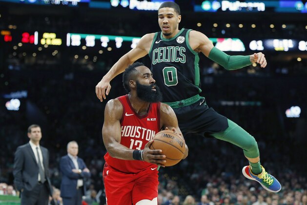 Houston Rockets' James Harden (13) prepares to shoot from three-point territory as Boston Celtics' Jayson Tatum (0) defends during the second half of an NBA basketball game in Boston, Sunday, March 3, 2019. (AP Photo/Michael Dwyer)