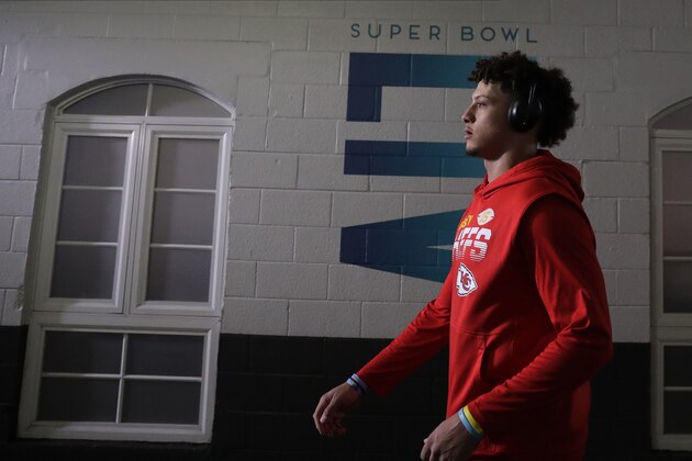 Kansas City Chiefs quarterback Patrick Mahomes walks towards the field before the NFL Super Bowl 54 football game between the San Francisco 49ers and Kansas City Chiefs Sunday, Feb. 2, 2020, in Miami Gardens, Fla. (AP Photo/Brynn Anderson)