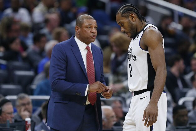 ORLANDO, FLORIDA - JANUARY 26:  Head coach Doc Rivers of the LA Clippers talks with Kawhi Leonard #2 against the Orlando Magic during the second half at Amway Center on January 26, 2020 in Orlando, Florida. NOTE TO USER: User expressly acknowledges and agrees that, by downloading and/or using this photograph, user is consenting to the terms and conditions of the Getty Images License Agreement.  (Photo by Michael Reaves/Getty Images)