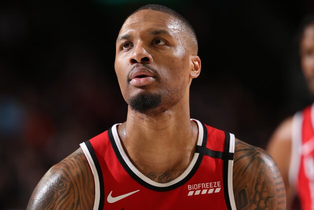 PORTLAND, OR - MARCH 10: Damian Lillard #0 of the Portland Trail Blazers shoots free throws during the game on March 10 , 2020 at the Moda Center Arena in Portland, Oregon. NOTE TO USER: User expressly acknowledges and agrees that, by downloading and or using this photograph, user is consenting to the terms and conditions of the Getty Images License Agreement. Mandatory Copyright Notice: Copyright 2020 NBAE (Photo by Sam Forencich/NBAE via Getty Images)