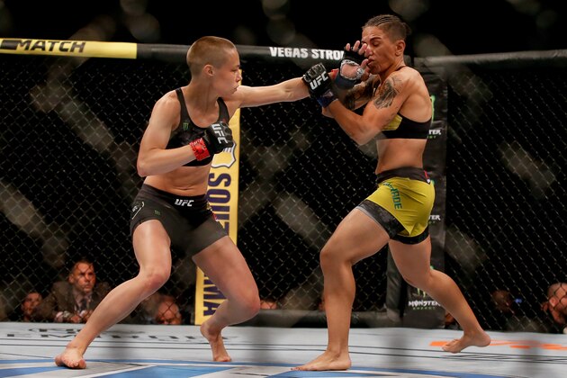 RIO DE JANEIRO, BRAZIL - MAY 11: (L-R) Rose Namajunas of USA punches Jessica Andrade of Brazil in their women's strawweight championship bout during the UFC 237 event at Jeunesse Arena on May 11, 2019 in Rio de Janeiro, Brazil. (Photo by Alexandre Schneider/Getty Images)