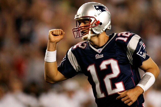 New England Patriots quarterback Tom Brady pumps his fist after a touchdown pass to fullback Patrick Pass in the first quarter against the New Orleans Saints in Foxborough, Mass., Thursday, Aug. 18, 2005. (AP Photo/Winslow Townson)