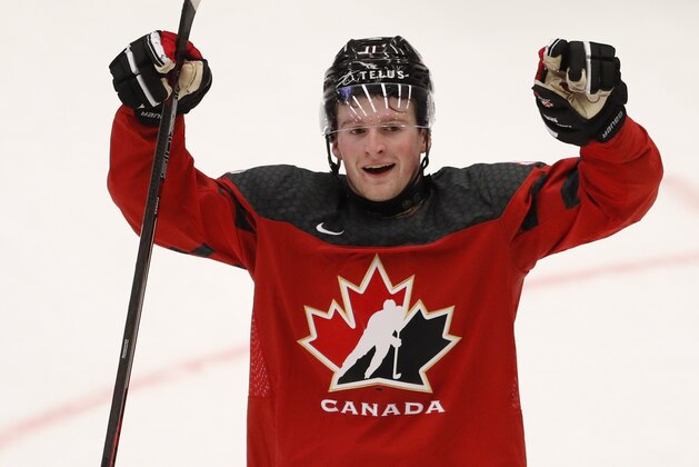 Canada's Alexis Lafreniere celebrates his sides first goal during the U20 Ice Hockey Worlds match between Canada and the United States in Ostrava, Czech Republic, Thursday, Dec. 26, 2019. (AP Photo/Petr David Josek) Canada's Alexis Lafreniere celebrates his sides first goal during the U20 Ice Hockey Worlds match between Canada and the United States in Ostrava, Czech Republic, Thursday, Dec. 26, 2019. (AP Photo/Petr David Josek)