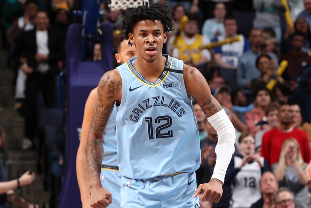 MEMPHIS, TN - MARCH 10: Ja Morant #12 of the Memphis Grizzlies reacts to a play against the Orlando Magic on March 10, 2020 at FedExForum in Memphis, Tennessee. NOTE TO USER: User expressly acknowledges and agrees that, by downloading and or using this photograph, User is consenting to the terms and conditions of the Getty Images License Agreement. Mandatory Copyright Notice: Copyright 2020 NBAE (Photo by Joe Murphy/NBAE via Getty Images) MEMPHIS, TN - MARCH 10: Ja Morant #12 of the Memphis Grizzlies reacts to a play against the Orlando Magic on March 10, 2020 at FedExForum in Memphis, Tennessee. NOTE TO USER: User expressly acknowledges and agrees that, by downloading and or using this photograph, User is consenting to the terms and conditions of the Getty Images License Agreement. Mandatory Copyright Notice: Copyright 2020 NBAE (Photo by Joe Murphy/NBAE via Getty Images)