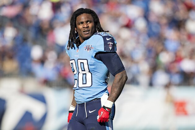 NASHVILLE, TN - DECEMBER 29:  Chris Johnson #28 of the Tennessee Titans watches a replay during a game against the Houston Texans at LP Field on December 29, 2013 in Nashville, Tennessee.  The Titans defeated the Texans 16-10.  (Photo by Wesley Hitt/Getty Images)