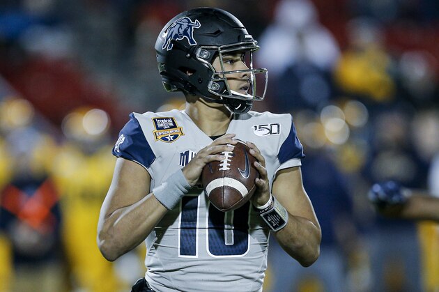 Utah State quarterback Jordan Love (10) looks to pass during the first half of the Frisco Bowl NCAA college football game against Kent State Friday, Dec. 20, 2019, in Frisco, Texas. Kent State won 51-41. (AP Photo/Brandon Wade)