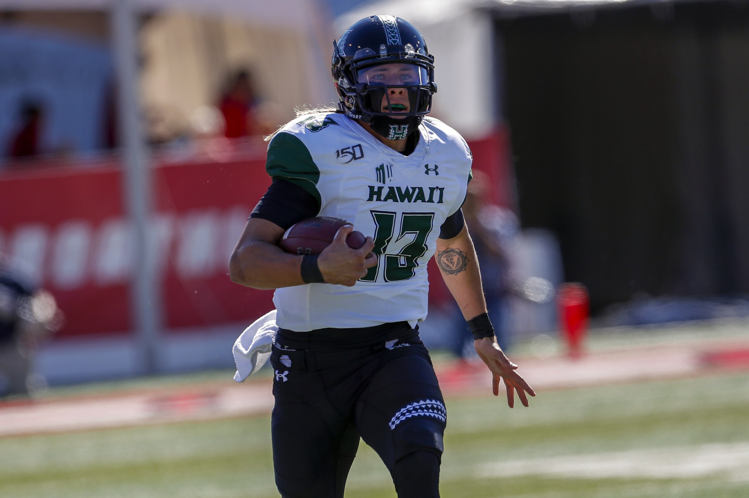 Hawaii quarterback Cole McDonald sprints to the end zone for a touchdown during the first half of an NCAA college football game against New Mexico on Saturday, Oct. 26, 2019 in Albuquerque, N.M. (AP Photo/Andres Leighton)
