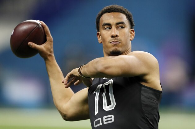 FILE - In this Thursday, Feb. 27, 2020, file photo, Utah State quarterback Jordan Love works out at the NFL football scouting combine in Indianapolis. After turning heads last month at the Senior Bowl, Love delivered with another impressive workout Thursday. (AP Photo/Charlie Neibergall, File)