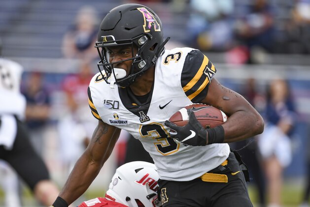 South Alabama safety Tré Young (5) tackles Appalachian State running back Darrynton Evans (3) during the second half of an NCAA college football game Saturday, Oct. 26, 2019, at Ladd-Peebles Stadium in Mobile, Ala. (AP Photo/Julie Bennett)