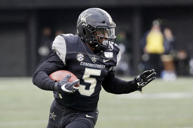Vanderbilt running back Ke'Shawn Vaughn plays against ETSU in the first half of an NCAA college football game Saturday, Nov. 23, 2019, in Nashville, Tenn. (AP Photo/Mark Humphrey)