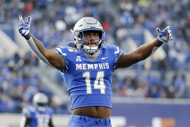 Memphis wide receiver Antonio Gibson pumps up the crowd during the first half of an NCAA college football game against Cincinnati for the American Athletic Conference championship Saturday, Dec. 7, 2019, in Memphis, Tenn. (AP Photo/Mark Humphrey)