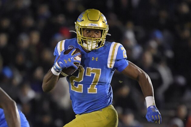 UCLA running back Joshua Kelley runs the ball during the first half of an NCAA college football game against California Saturday, Nov. 30, 2019, in Pasadena, Calif. (AP Photo/Mark J. Terrill)