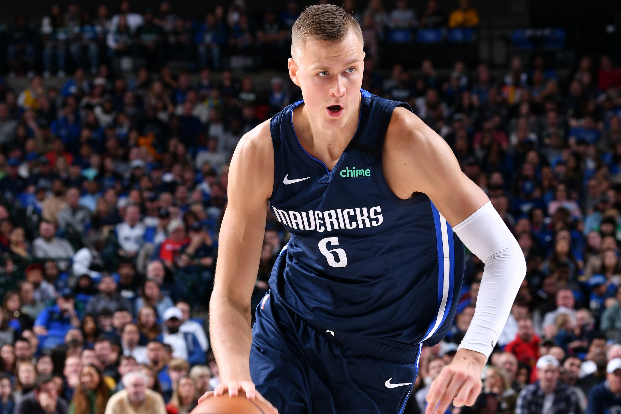 DALLAS, TX - MARCH 8: Kristaps Porzingis #6 of the Dallas Mavericks handles the ball against the Indiana Pacers on March 8, 2020 at the American Airlines Center in Dallas, Texas. NOTE TO USER: User expressly acknowledges and agrees that, by downloading and or using this photograph, User is consenting to the terms and conditions of the Getty Images License Agreement. Mandatory Copyright Notice: Copyright 2020 NBAE (Photo by Glenn James/NBAE via Getty Images) DALLAS, TX - MARCH 8: Kristaps Porzingis #6 of the Dallas Mavericks handles the ball against the Indiana Pacers on March 8, 2020 at the American Airlines Center in Dallas, Texas. NOTE TO USER: User expressly acknowledges and agrees that, by downloading and or using this photograph, User is consenting to the terms and conditions of the Getty Images License Agreement. Mandatory Copyright Notice: Copyright 2020 NBAE (Photo by Glenn James/NBAE via Getty Images)