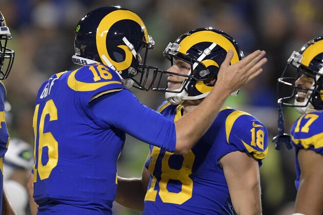 Los Angeles Rams wide receiver Cooper Kupp, right, celebrates after scoring with quarterback Jared Goff during the first half of an NFL football game against the Seattle Seahawks Sunday, Dec. 8, 2019, in Los Angeles. (AP Photo/Kyusung Gong)