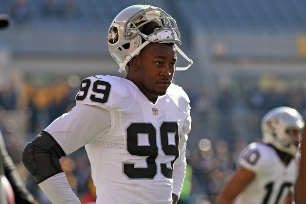 PITTSBURGH, PA - NOVEMBER 8:  Linebacker Aldon Smith #99 of the Oakland Raiders looks on from the field before a game against the Pittsburgh Steelers at Heinz Field on November 8, 2015 in Pittsburgh, Pennsylvania. The Steelers defeated the Raiders 38-35. (Photo by George Gojkovich/Getty Images)