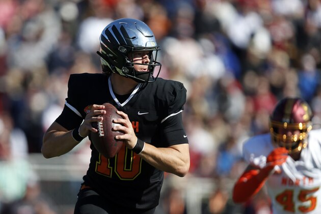 South quarterback Justin Herbert of Oregon (10) during the first half of the Senior Bowl college football game Saturday, Jan. 25, 2020, in Mobile, Ala. (AP Photo/Butch Dill)
