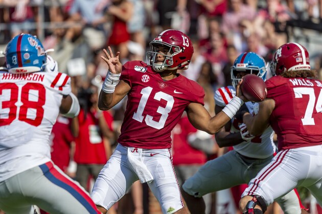FILE - In this Sept. 28, 2019, file photo, Alabama quarterback Tua Tagovailoa (13) throws a pass during the first half of the team's NCAA college football game against Mississippi in Tuscaloosa, Ala. Tagovailoa’s agent says the quarterback is healthy and will be ready for training camp. Tagovailoa held a virtual pro day with former NFL quarterback Trent Dilfer on Thursday, April 9, after the former Alabama star’s personal pro day was canceled because of the coronavirus outbreak. Tagovailoa injured his hip on Nov. 15 and had season-ending surgery two days later. He is expected to be among the top five picks in the NFL draft later this month. (AP Photo/Vasha Hunt, File)