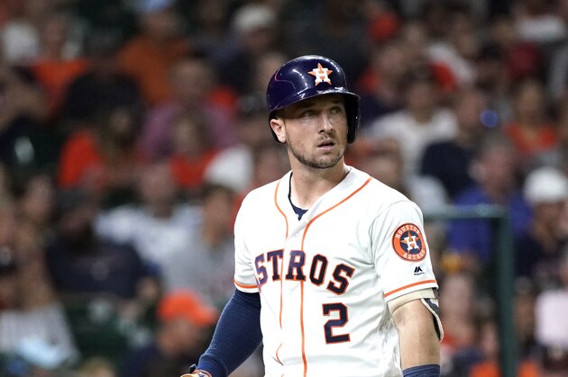 Houston Astros third baseman Alex Bregman walks back to the dugout during the sixth inning of a baseball game against the Detroit Tigers Monday, Aug. 19, 2019, in Houston. (AP Photo/David J. Phillip)