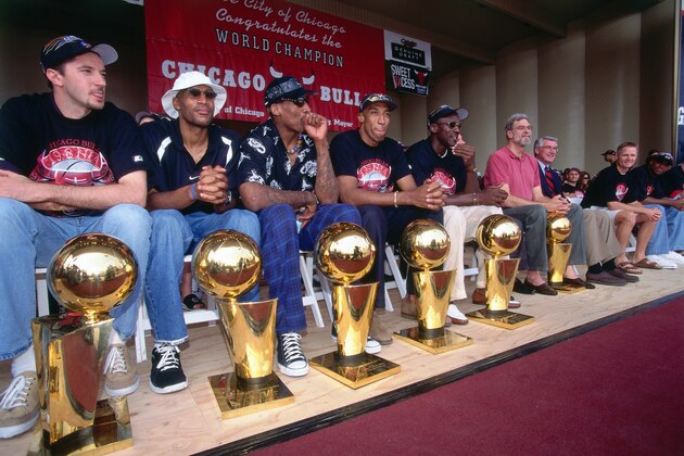 CHICAGO, IL - JUNE 16: Toni Kukoc#7, Ron Harper #9, Dennis Rodman #91, Scottie Pippen #33, Michael Jordan #23, and Head Coach Phil Jackson of the Chicago Bulls during the 1998 Chicago Bulls Celebration Rally on June 16, 1998 at Grant Park in Chicago, Illinois. NOTE TO USER: User expressly acknowledges and agrees that, by downloading and/or using this photograph, user is consenting to the terms and conditions of the Getty Images License Agreement. Mandatory Copyright Notice: Copyright 1998 NBAE (Photo by Andrew D. Bernstein/NBAE via Getty Images) CHICAGO, IL - JUNE 16: Toni Kukoc#7, Ron Harper #9, Dennis Rodman #91, Scottie Pippen #33, Michael Jordan #23, and Head Coach Phil Jackson of the Chicago Bulls during the 1998 Chicago Bulls Celebration Rally on June 16, 1998 at Grant Park in Chicago, Illinois. NOTE TO USER: User expressly acknowledges and agrees that, by downloading and/or using this photograph, user is consenting to the terms and conditions of the Getty Images License Agreement. Mandatory Copyright Notice: Copyright 1998 NBAE (Photo by Andrew D. Bernstein/NBAE via Getty Images)