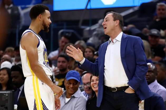 SAN FRANCISCO, CALIFORNIA - OCTOBER 05:  Golden State Warriors owner Joe Lacob speaks to Stephen Curry #30 during their game against the Los Angeles Lakers at Chase Center on October 05, 2019 in San Francisco, California.  NOTE TO USER: User expressly acknowledges and agrees that, by downloading and or using this photograph, User is consenting to the terms and conditions of the Getty Images License Agreement.  (Photo by Ezra Shaw/Getty Images)
