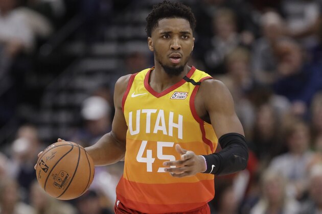Utah Jazz guard Donovan Mitchell (45) brings the ball up court in the second half during an NBA basketball game against the Portland Trail Blazers Friday, Feb. 7, 2020, in Salt Lake City. (AP Photo/Rick Bowmer)