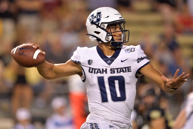 WINSTON SALEM, NORTH CAROLINA - AUGUST 30: Jordan Love #10 of the Utah State Aggies against the Wake Forest Demon Deacons during their game at BB&T Field on August 30, 2019 in Winston Salem, North Carolina. Wake Forest won 38-35. (Photo by Grant Halverson/Getty Images)