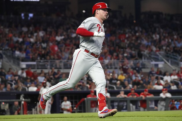 Philadelphia Phillies' Rhys Hoskins runs to first base after hitting a two-run home run during the fourth inning of the team's baseball game against the Atlanta Braves on Tuesday, Sept. 17, 2019, in Atlanta. (AP Photo/John Bazemore)