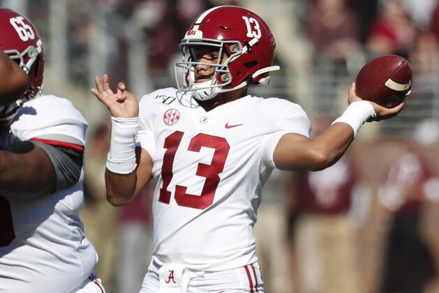 Alabama quarterback Tua Tagovailoa (13) throws a pass against Mississippi State during the first half of an NCAA college football game in Starkville, Miss., Saturday, Nov. 16, 2019. (AP Photo/Rogelio V. Solis)