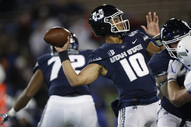 Utah State quarterback Jordan Love throws a pass against Air Force in the second half of an NCAA college football game Saturday, Oct. 26, 2019, at Air Force Academy, Colo. Air Force won 31-7. (AP Photo/David Zalubowski)