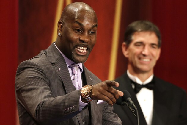 FILE - In this Sept. 8, 2013, file photo, inductee Gary Payton, left, speaks during the enshrinement ceremony for the 2013 class of the Naismith Memorial Basketball Hall of Fame as Hall-of-Famer John Stockton, right, looks on at Symphony Hall in Springfield, Mass. Payton told Sports Illustrated on May 19, 2016, that he doesn't think Golden State's Stephen Curry should have been the NBA's first unanimous MVP. (AP Photo/Steven Senne, File) FILE - In this Sept. 8, 2013, file photo, inductee Gary Payton, left, speaks during the enshrinement ceremony for the 2013 class of the Naismith Memorial Basketball Hall of Fame as Hall-of-Famer John Stockton, right, looks on at Symphony Hall in Springfield, Mass. Payton told Sports Illustrated on May 19, 2016, that he doesn't think Golden State's Stephen Curry should have been the NBA's first unanimous MVP. (AP Photo/Steven Senne, File)