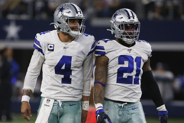Dallas Cowboys quarterback Dak Prescott (4) and running back Ezekiel Elliott (21) during the second half of an NFL football game against the Washington Redskins in Arlington, Texas, Sunday, Dec. 15, 2019. (AP Photo/Ron Jenkins)