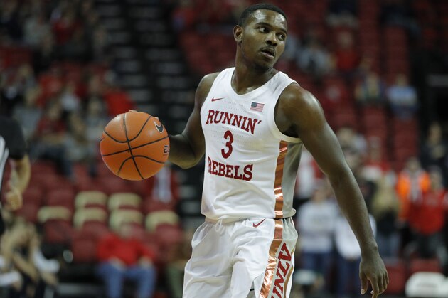 UNLV's Amauri Hardy (3) plays against Utah State during an NCAA college basketball game Wednesday, Jan. 1, 2020, in Las Vegas. (AP Photo/John Locher) UNLV's Amauri Hardy (3) plays against Utah State during an NCAA college basketball game Wednesday, Jan. 1, 2020, in Las Vegas. (AP Photo/John Locher)