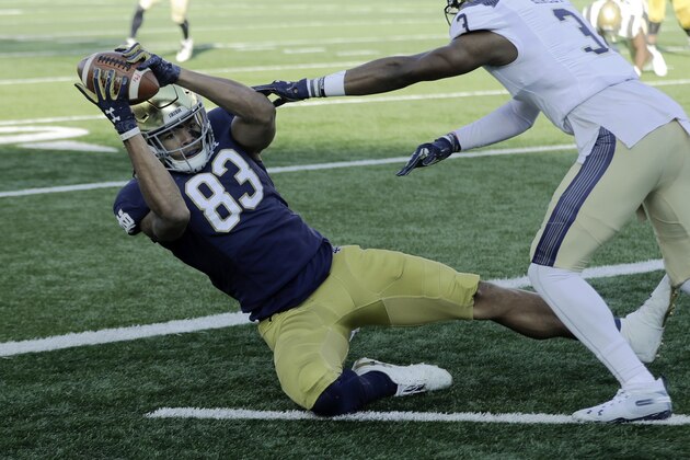 Notre Dame wide receiver Chase Claypool (83) makes a touchdown reception against Navy cornerback Cameron Kinley (3) during the first half of an NCAA college football game, Saturday, Nov. 16, 2019, in South Bend, Ind.(AP Photo/Darron Cummings) Notre Dame wide receiver Chase Claypool (83) makes a touchdown reception against Navy cornerback Cameron Kinley (3) during the first half of an NCAA college football game, Saturday, Nov. 16, 2019, in South Bend, Ind.(AP Photo/Darron Cummings)
