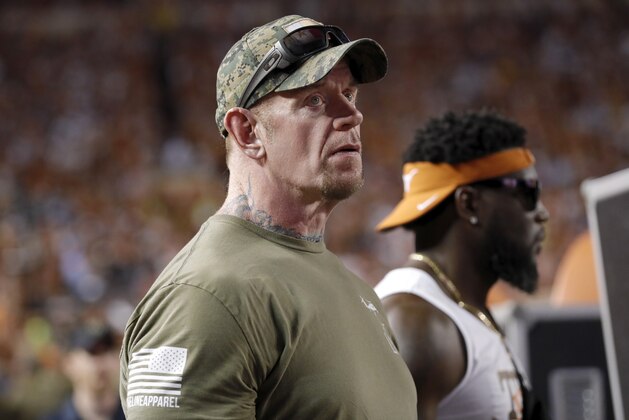 AUSTIN, TX - SEPTEMBER 07:  WWE legend The Undertaker watches from the sideline during the game between the Texas Longhorns and the LSU Tigers at Darrell K Royal-Texas Memorial Stadium on September 7, 2019 in Austin, Texas.  (Photo by Tim Warner/Getty Images)
